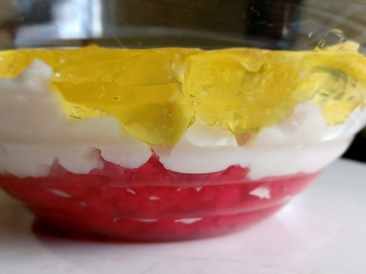 Christmas Jell-O fridge pudding (flavors: raspberry, lemon and milk)